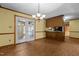 Dining area with kitchen pass-through and french door at 5437 Grasshopper Rd, Raleigh, NC 27610
