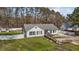 Charming exterior view of home with wheelchair ramp and large yard at 5437 Grasshopper Rd, Raleigh, NC 27610