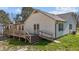 Rear view of house with deck and wheelchair ramp at 5437 Grasshopper Rd, Raleigh, NC 27610