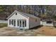Garage features white siding and matching shutters at 5437 Grasshopper Rd, Raleigh, NC 27610