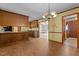 Open concept kitchen with wood cabinets at 5437 Grasshopper Rd, Raleigh, NC 27610