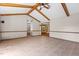 Bright living room features vaulted ceilings with exposed beams at 5437 Grasshopper Rd, Raleigh, NC 27610