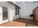 Outdoor patio with grill, bench and awning offers a cozy space to relax at 5569 Sea Daisy Dr, Raleigh, NC 27606