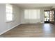Bright living room with lots of natural light, neutral walls, and hardwood floors, ideal for gatherings at 608 Cecil St, Durham, NC 27707
