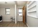 Mud room with shelving and exterior access at 608 Cecil St, Durham, NC 27707