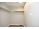 Spacious walk-in closet with wood floors and ample shelving for organized storage solutions at 608 Cecil St, Durham, NC 27707