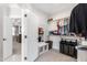 Walk-in closet with custom shelving and an opening to the primary bedroom at 6108 Norwood Place Ct, Raleigh, NC 27613