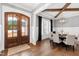 Formal dining room with a round table, stylish chairs, and elegant lighting, ideal for hosting dinner parties at 6108 Norwood Place Ct, Raleigh, NC 27613