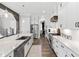 Beautiful kitchen with a view to the dining room and stainless steel appliances and island at 6108 Norwood Place Ct, Raleigh, NC 27613