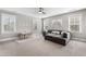 Spacious playroom with natural light, a comfy sectional, and a cute table and chairs at 6108 Norwood Place Ct, Raleigh, NC 27613