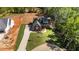 Aerial view of gray home with a long drive and extensive yard space at 65 Stream View Way, Spring Hope, NC 27882