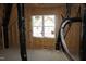 Unfinished attic with wrapped duct work ready for insulation and final construction at 65 Stream View Way, Spring Hope, NC 27882