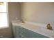 Bathroom vanity with double sinks, ample storage, and modern fixtures at 65 Stream View Way, Spring Hope, NC 27882