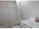 New bathroom featuring white vanity with brushed nickel fixtures, toilet, and tub with shower at 65 Stream View Way, Spring Hope, NC 27882