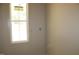 Bathroom with a window bringing in natural light at 65 Stream View Way, Spring Hope, NC 27882