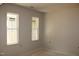 Bedroom with base molding and natural light through two large windows at 65 Stream View Way, Spring Hope, NC 27882
