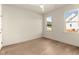 Bedroom with hardwood floors, and two windows at 65 Stream View Way, Spring Hope, NC 27882