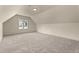 Upstairs bedroom with natural lighting, plush carpeting, and finished trim at 65 Stream View Way, Spring Hope, NC 27882