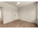 Empty bedroom with hardwood floors, a ceiling fan, and a closet at 65 Stream View Way, Spring Hope, NC 27882
