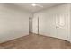 Bright bedroom featuring hardwood floors, neutral walls, ceiling fan, and closet space at 65 Stream View Way, Spring Hope, NC 27882