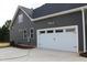 Side view of home's garage and exterior at 65 Stream View Way, Spring Hope, NC 27882