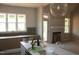 Bright kitchen with white island, stainless appliances and large windows overlooking the yard at 65 Stream View Way, Spring Hope, NC 27882