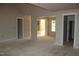 Bright living room with large windows at 65 Stream View Way, Spring Hope, NC 27882