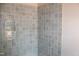 Stylish shower with gray-green tiled walls and a recessed niche at 65 Stream View Way, Spring Hope, NC 27882