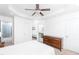 Bright and airy main bedroom featuring ceiling fan and neutral tones throughout at 6808 Lakinsville Ln, Raleigh, NC 27610