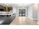 Kitchen island dining space with access to outdoor patio at 692 Port Dr, Henderson, NC 27537