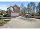 Spacious driveway leading to a two-car garage, complete with a basketball hoop at 706 Oldwyck Dr, Fuquay Varina, NC 27526