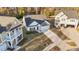 Aerial view of charming homes with well-manicured lawns at 75 Red Crabapple Ct, Clayton, NC 27520