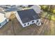 A well-maintained backyard with a patio and a view of the neighborhood at 75 Red Crabapple Ct, Clayton, NC 27520