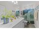 Modern bathroom with a white vanity, a large mirror, and a decorative shower curtain at 75 Red Crabapple Ct, Clayton, NC 27520
