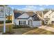 Attractive single-Gathering home with stone and vinyl siding, a well-kept lawn, and a welcoming front entrance at 75 Red Crabapple Ct, Clayton, NC 27520