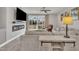 Bright living room with views, large sectional, fireplace and outdoor access at 818 Lilyquist Way, Wake Forest, NC 27587