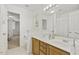 Bathroom with double vanity, ample counter space, and lots of storage at 8215 Cushing St, Raleigh, NC 27613