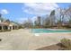 Spacious community swimming pool area with ample deck space and well-maintained surroundings at 8215 Cushing St, Raleigh, NC 27613
