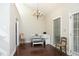 Cozy breakfast nook with hardwood floors, built-in seating, and bright natural lighting at 8310 Wycombe Ln, Raleigh, NC 27615