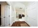 Inviting foyer with gleaming hardwood floors, leading to a spacious living area with a fireplace at 8310 Wycombe Ln, Raleigh, NC 27615
