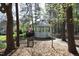 A gazebo nestled among trees, providing a serene retreat for outdoor enjoyment at 8310 Wycombe Ln, Raleigh, NC 27615