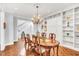 Charming dining room with hardwood floors, and ample storage at 10 E Madison, Pittsboro, NC 27312