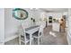 Open dining area adjacent to a modern kitchen at 10 E Madison, Pittsboro, NC 27312