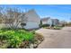 Charming home exterior with well-maintained landscaping and a spacious driveway at 10 E Madison, Pittsboro, NC 27312