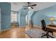 Spacious bedroom with hardwood floors, a ceiling fan, and lots of natural light perfect for relaxation at 101 Barriedale Cir, Cary, NC 27519
