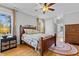 Comfortable bedroom with hardwood floors, neutral walls, and natural light at 101 Barriedale Cir, Cary, NC 27519