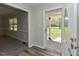 Inviting foyer featuring wood floors and an open view to the front porch at 10317 Lake Wheeler Rd, Fuquay Varina, NC 27526