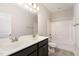 Bathroom boasts dual sinks and shower-tub combo at 104 Bailey Park Ct, Cary, NC 27513