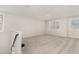 Spacious bonus room with plush carpeting and bright natural light at 104 Bailey Park Ct, Cary, NC 27513