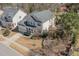 Charming two-story home with attached garage and well-maintained landscaping in a residential neighborhood at 104 Bailey Park Ct, Cary, NC 27513